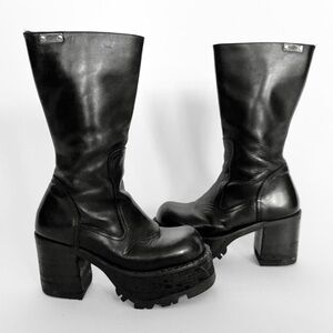 Elegant Black Leather Heeled Boots